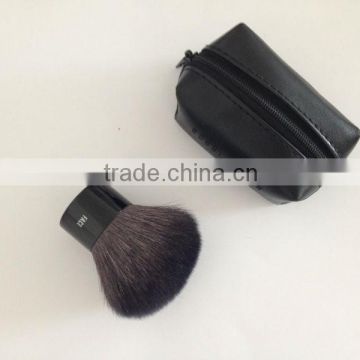 black kabuki brush with cosmetic bag