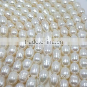 10-11mm freshwater rice shape pearls strands big 2-2.5 holes