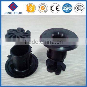 Non-clogging cooling tower spray nozzles