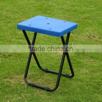 Blue plastic folding chair