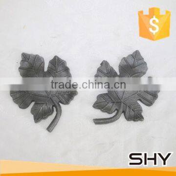 Wrought iron leaves and flowers cast steel components