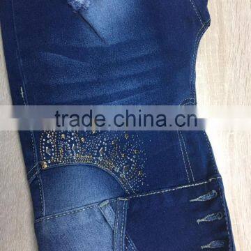 GZY Slim and Ripped Hole Women Jeans Leather Label Stock High Quality Wholesale China 2017 photo-4
