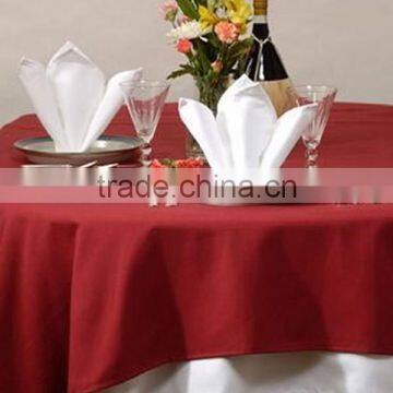 White Spun Polyester napkin and red spun poly table topper