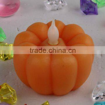 small pumpkin shaped LED candle