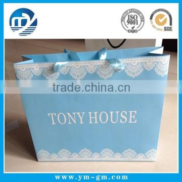 Blue gift paper bag with custom logo printed