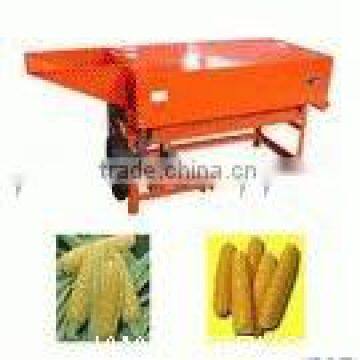 corn husker and thresher