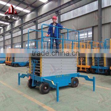 jinchuan brand 12m 500kg four-wheel mobile scissor lifing platform/portable hydraulic scissor table lift