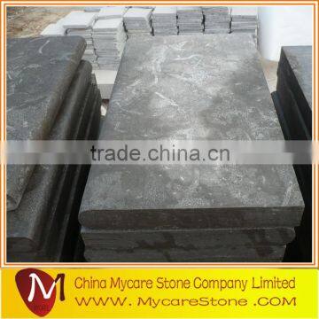 Acid wash blue limestone tile