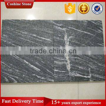 Polished and Flamed Iron Snow White Black Lactea Granite Tiles photo-3