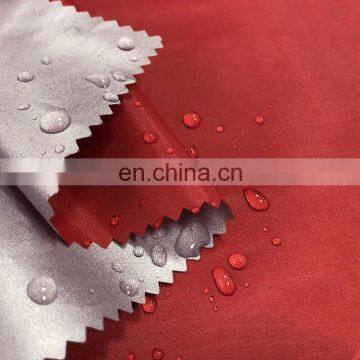 Chinese Supplier 100% Polyester 210t Taffeta Silver Coated Blackout Fabric photo-6
