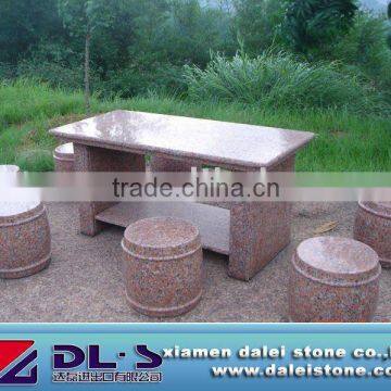 red granite table and chair