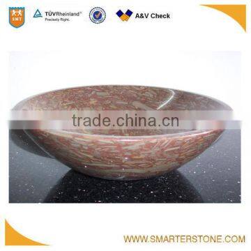 Extraordinary natural stone red hand basin