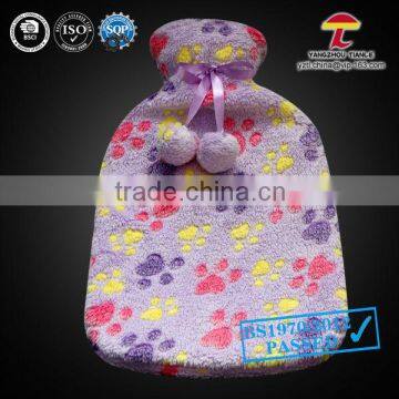 BS natural rubber hot water bottle with purple pawprint cover