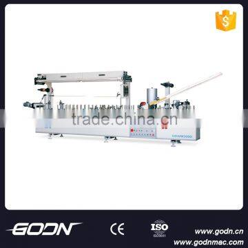 COLD GLUE PROFILE WRAPPING MACHINE