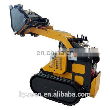 Compact mini skid steer laoder with lots of attachments