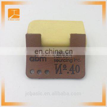 Custom Wholesale Debossed Logo Genuine Leather Label for Jeans Trousers photo-5