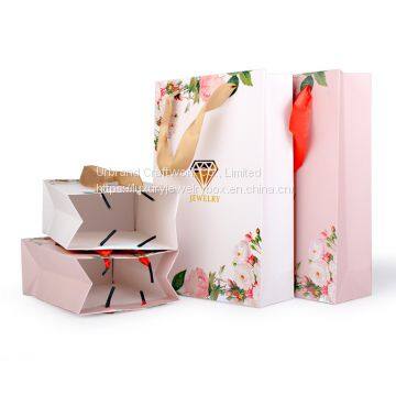 Sell good looking high quality jewelry paper shopping bags with custom logo Urbrand