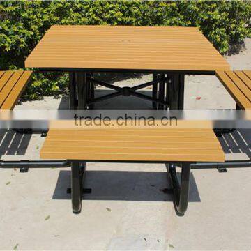 Recycled plastic outdoor table with bench street furniture