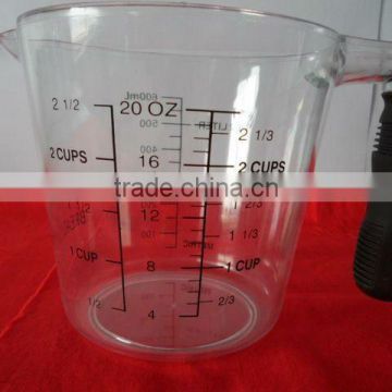 20 oz plastic measuring cup and scale with rubber grip