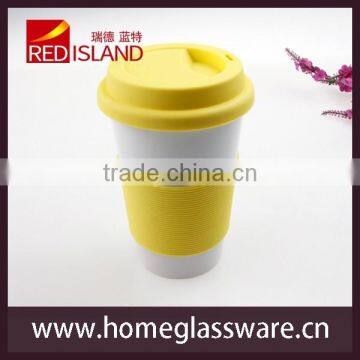 Colourworks Ceramic Mug With yellow Silicone Band And Lid