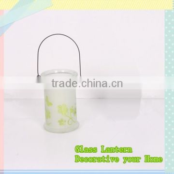 round glass lantern with spray