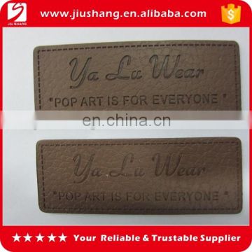 Cheap custom debossed jeans leather label with perforation