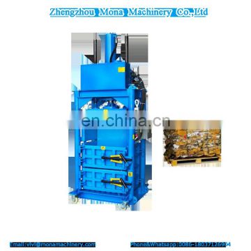 Waste cans Baling Press Machine /Vertical Hydraulic plastic bottle scrap baler manufacturer