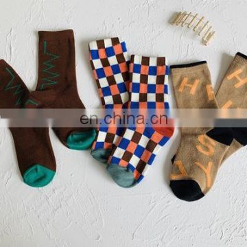 2020 autumn and winter new Korean version of the lattice group simple coffee bar children men and women short socks