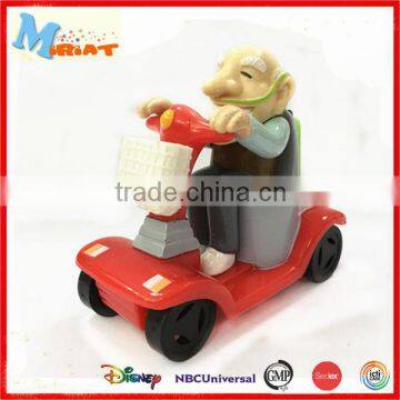 Plastic fantasy geezer figure with pull back scooter toy