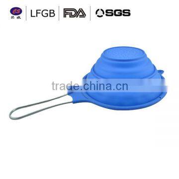 2014 New design fashionanble heat resistant silicone strainer spoon