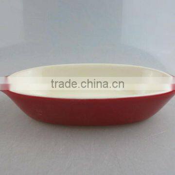 red-glazed ceramic oval tableware