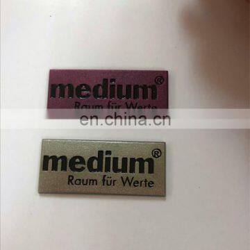 Metal nameplate for wood furniture