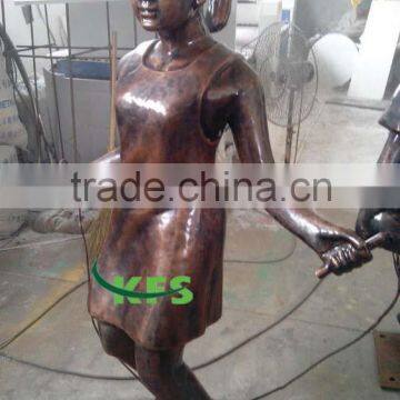 Bronze rope skipping school girl sculpture