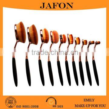 Hot selling cosmetic foundation brush tooth shape 10 pcs oval brushes rose gold