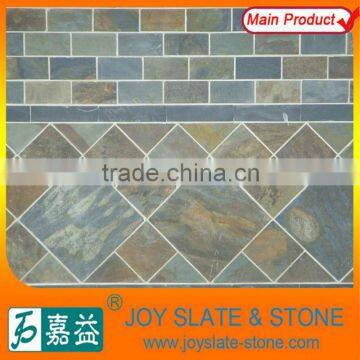 House walls facing tile with external covering rocks