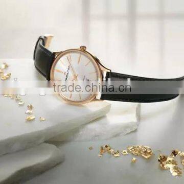 rose gold bezel watch with leather band day/date display timepieces