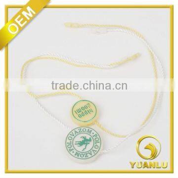 Embossed Logo Seal Tag in Jewelry Plastic Seal Tag With Logo String