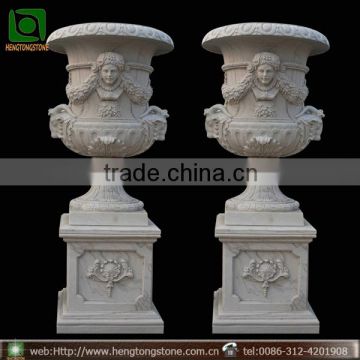 Carved stone garden planter