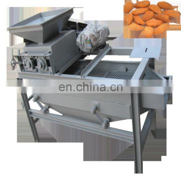 New designed almond cracking machine/hazelnut shell machine/small almond sheller