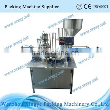 XBG-900II rotary type cup filling and sealing machine