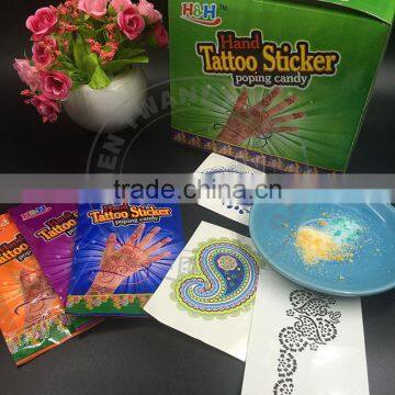 Hand tattoo sticker popping candy