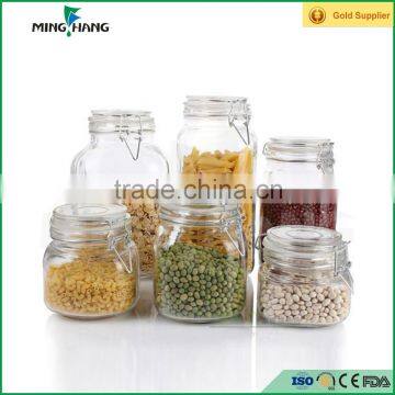 Wholesale empty recycled glass food storage jar with swing top caps