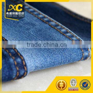 Woven 9oz cotton indigo grid denim
