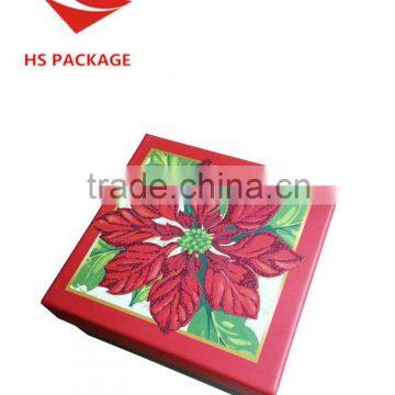 paper gift box with shimmering powder and UV-coating