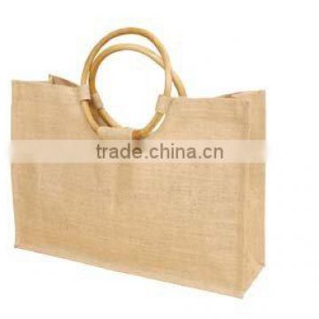 Eco-Friendly Laminated Jute Tote Bag - features round cane handles and comes with your logo.