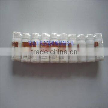 High Speed Automatic Pesticide Bottle Heat Shrink Packaging Machine photo-5