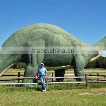 People take a photo with our huge dinosaur