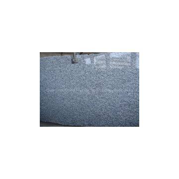 rippling white flowre  granite g slab