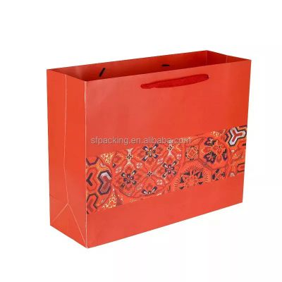 red paper packaging shopping bags