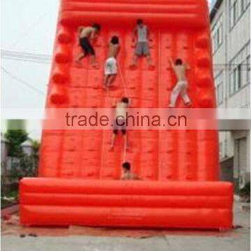 red inflatable climbing wall